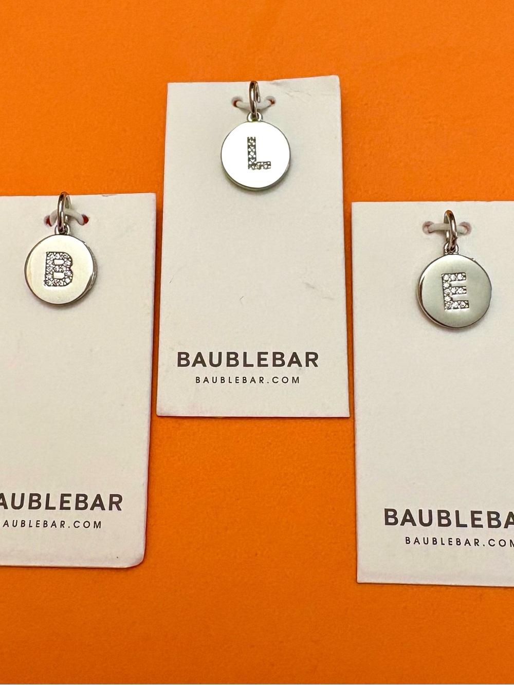 BaubleBar Silver Initial Charms – Personalized Letter Pendants.